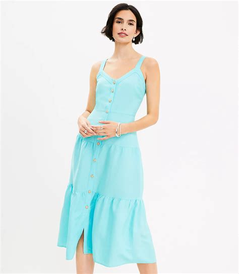 STRAPPY LINEN BLEND MIDI DRESS .